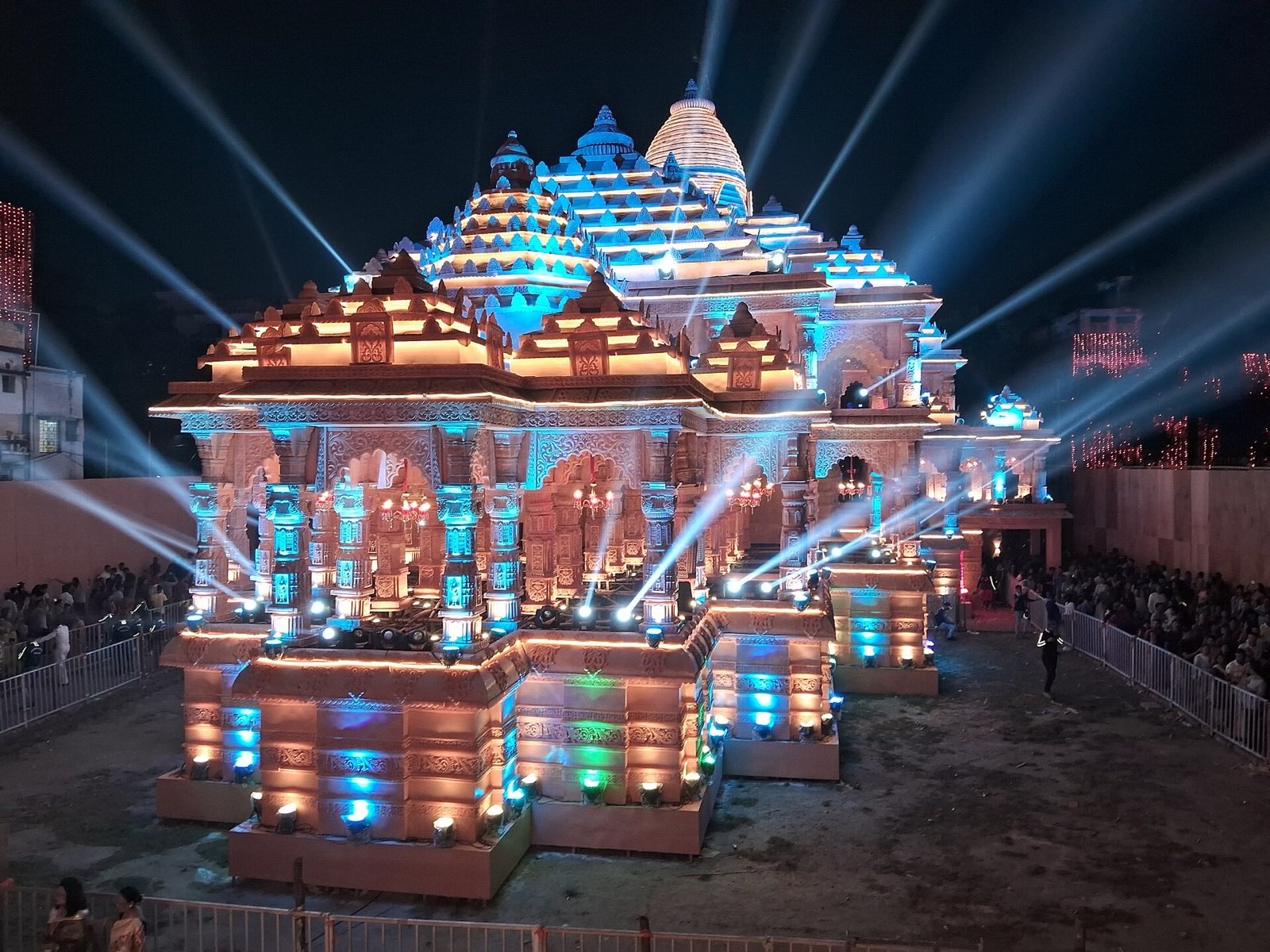 A decorated Durga Puja pandal at night.