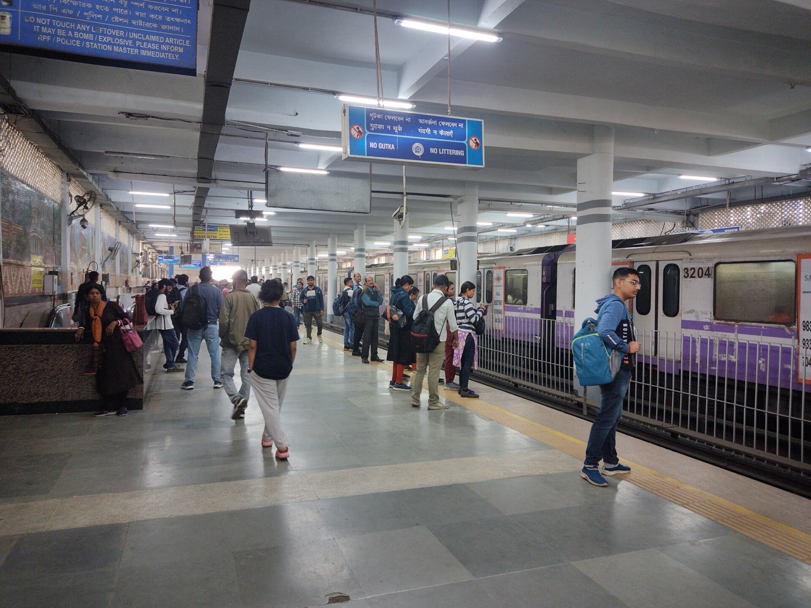 A Kolkata Metro train at a platform.